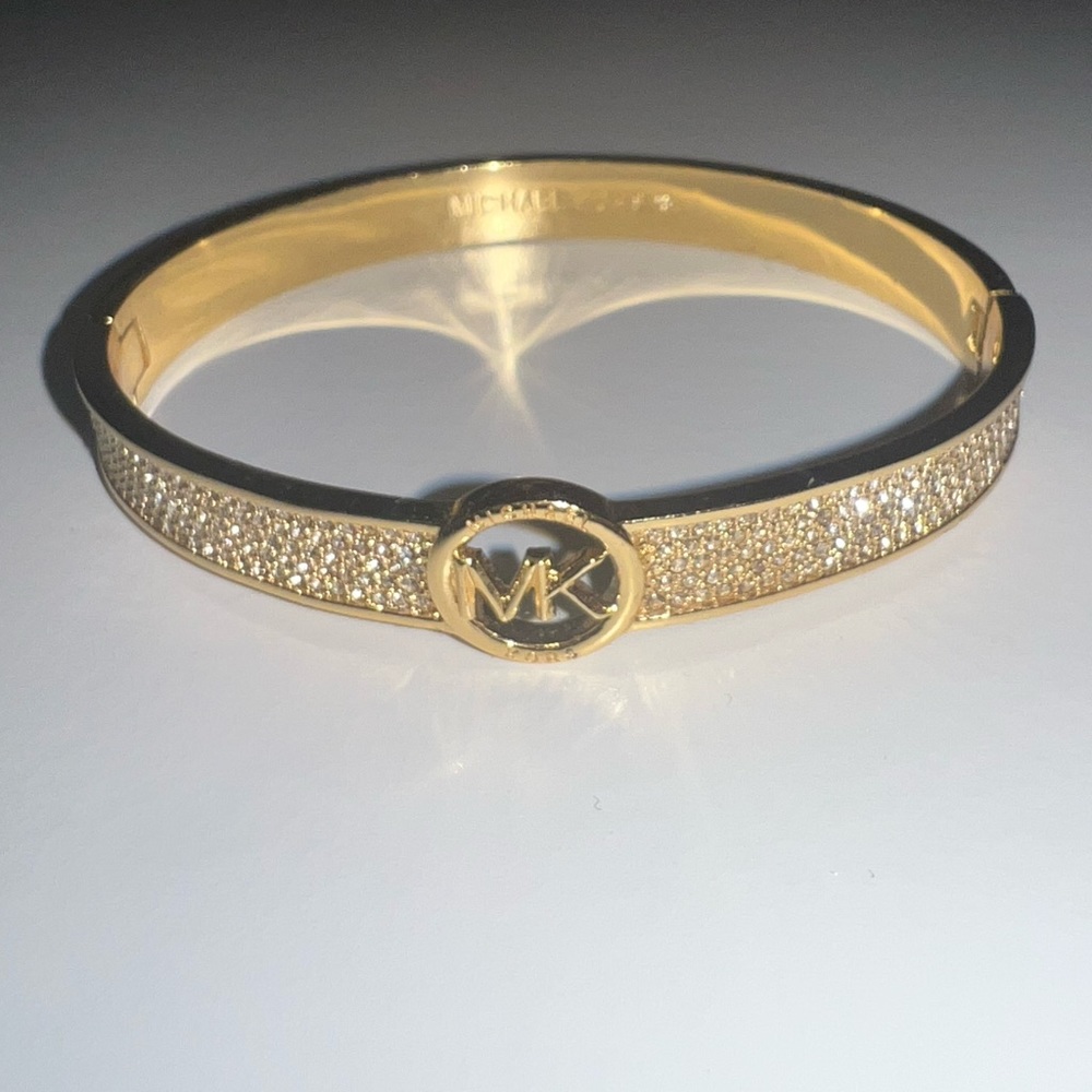 Gold MK bangle